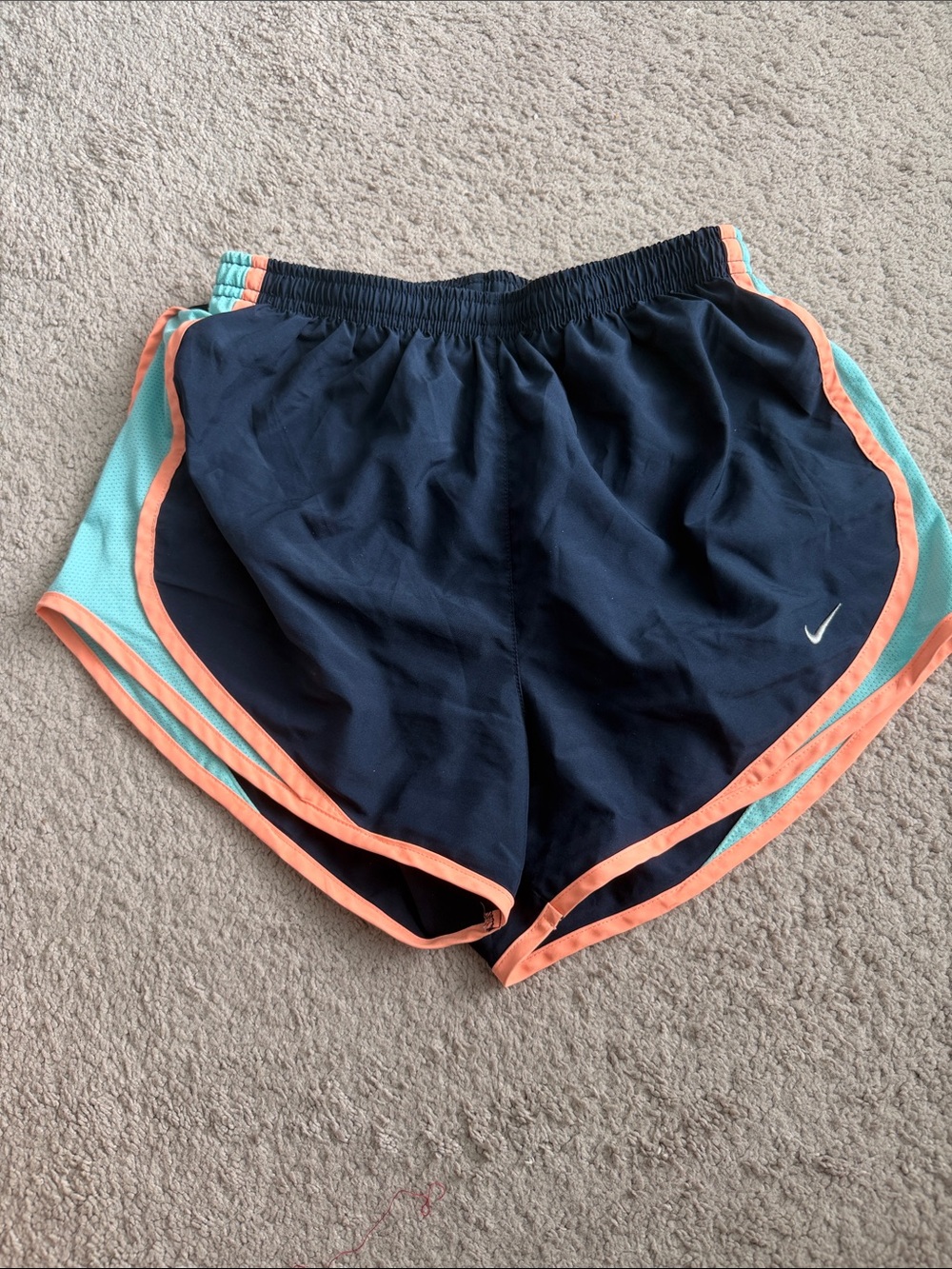 Nike Women's Navy Athletic Shorts with Aqua Panels and Coral Trim
